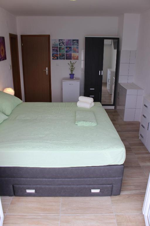 Postel nebo postele na pokoji v ubytování Guest House Put