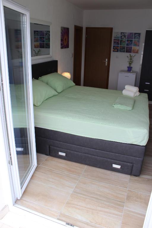Postel nebo postele na pokoji v ubytování Guest House Put