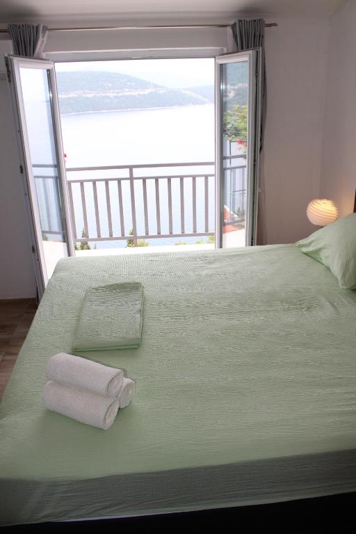 Postel nebo postele na pokoji v ubytování Guest House Put