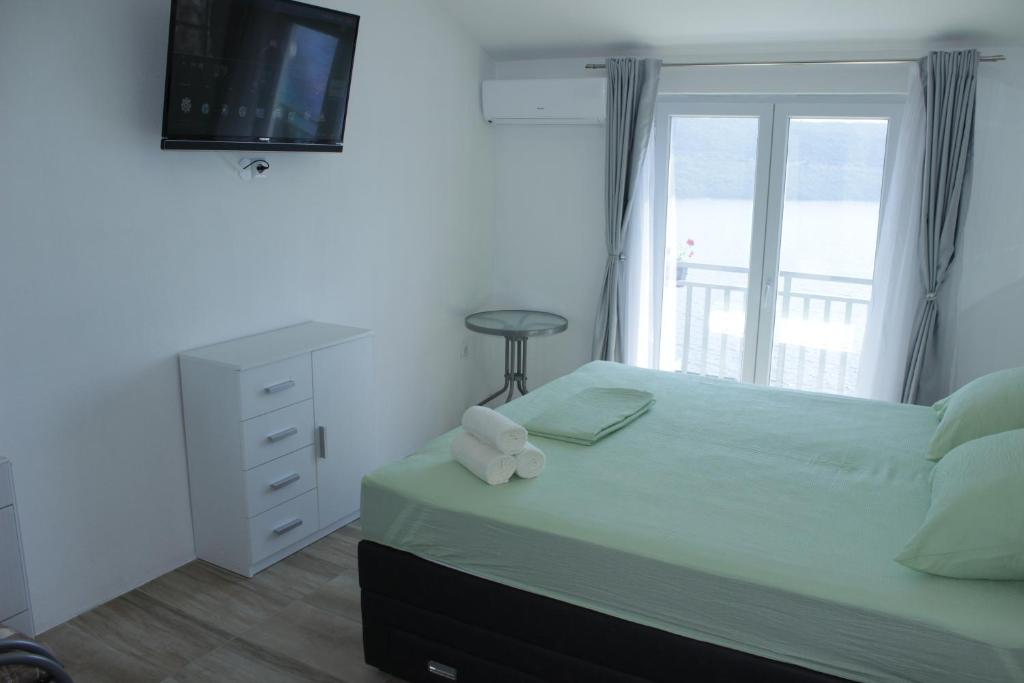Postel nebo postele na pokoji v ubytování Guest House Put