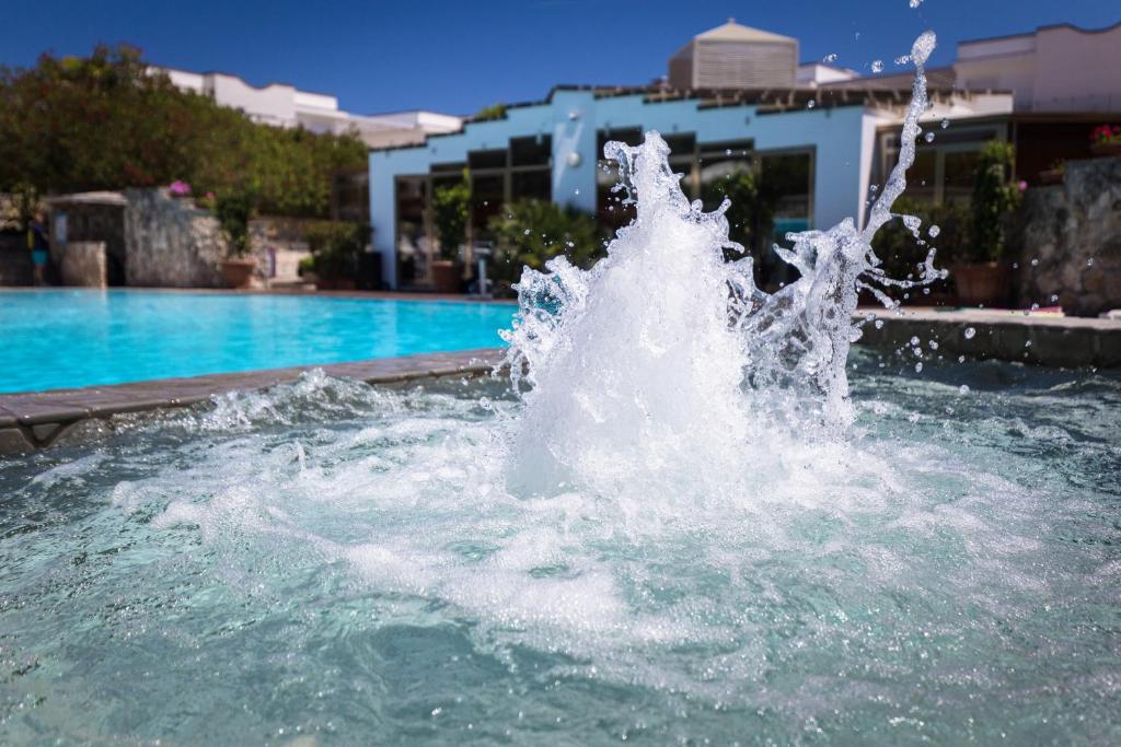 Bazén v ubytování Hotel Club Koiné nebo v jeho okolí