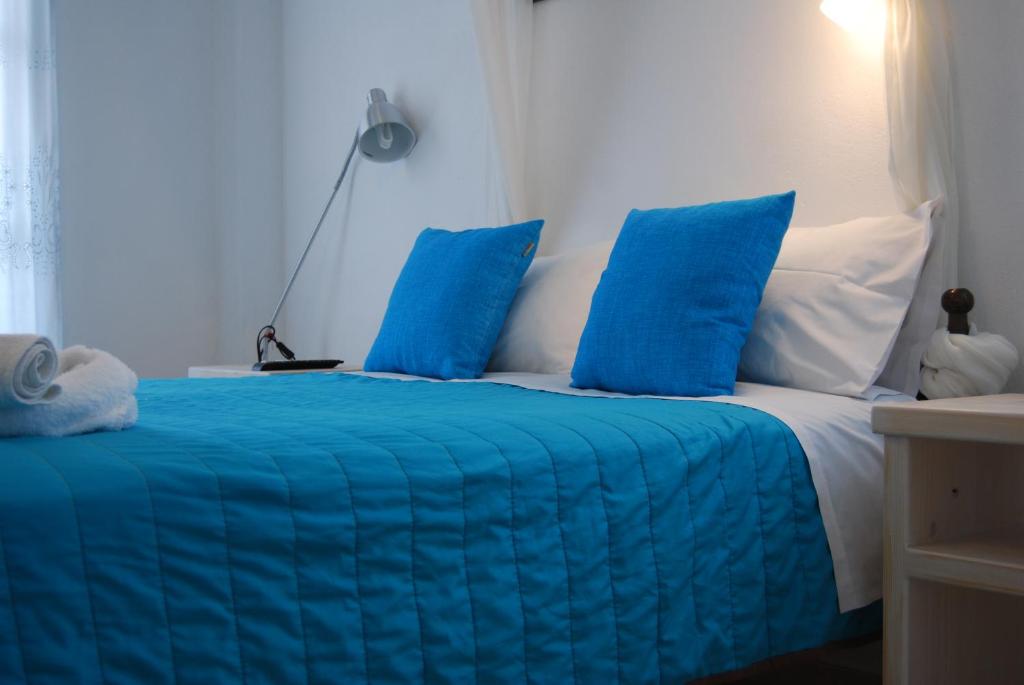 Letto o letti in una camera di Aretousa Villas