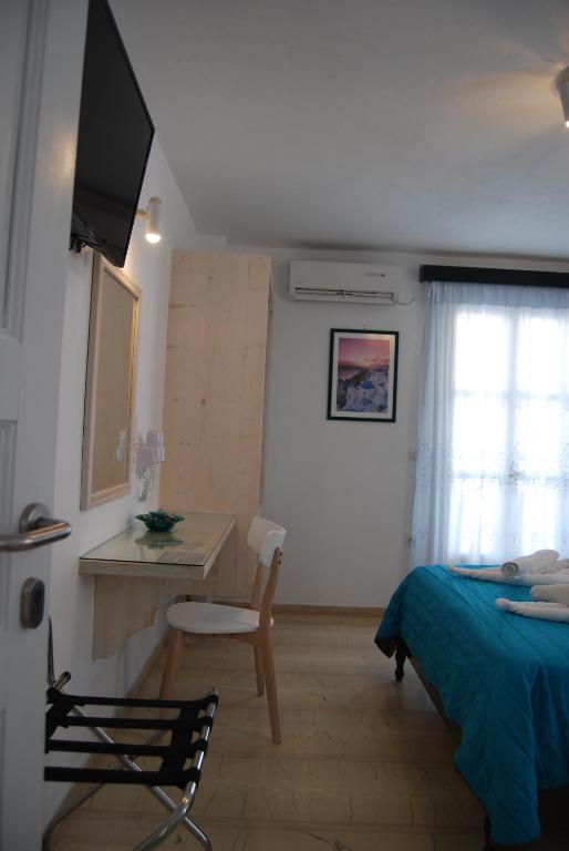 TV o dispositivi per l'intrattenimento presso Aretousa Villas