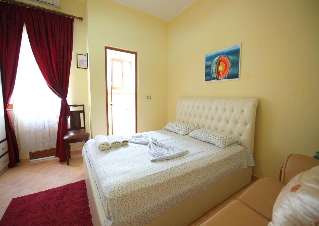 Postel nebo postele na pokoji v ubytování My Home Guest House