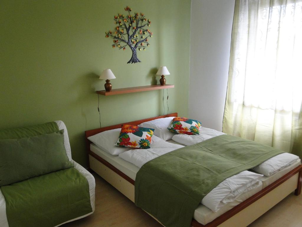 Postel nebo postele na pokoji v ubytování Apartments Liptov City