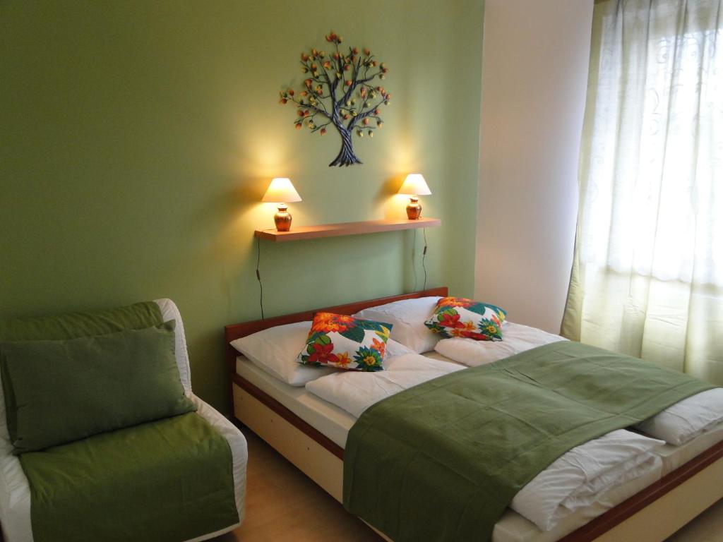 Postel nebo postele na pokoji v ubytování Apartments Liptov City