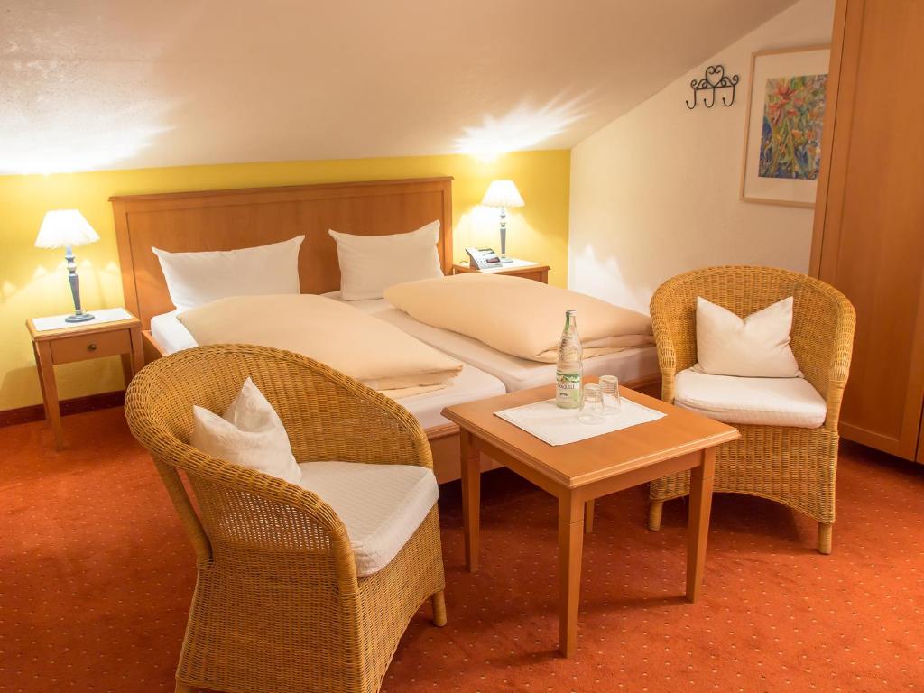 Rúm í herbergi á Hotel Garni Alpenblick