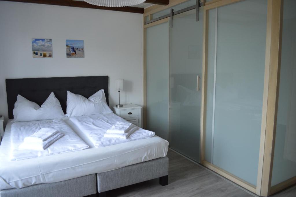 Postel nebo postele na pokoji v ubytování Jaeger Guesthouse
