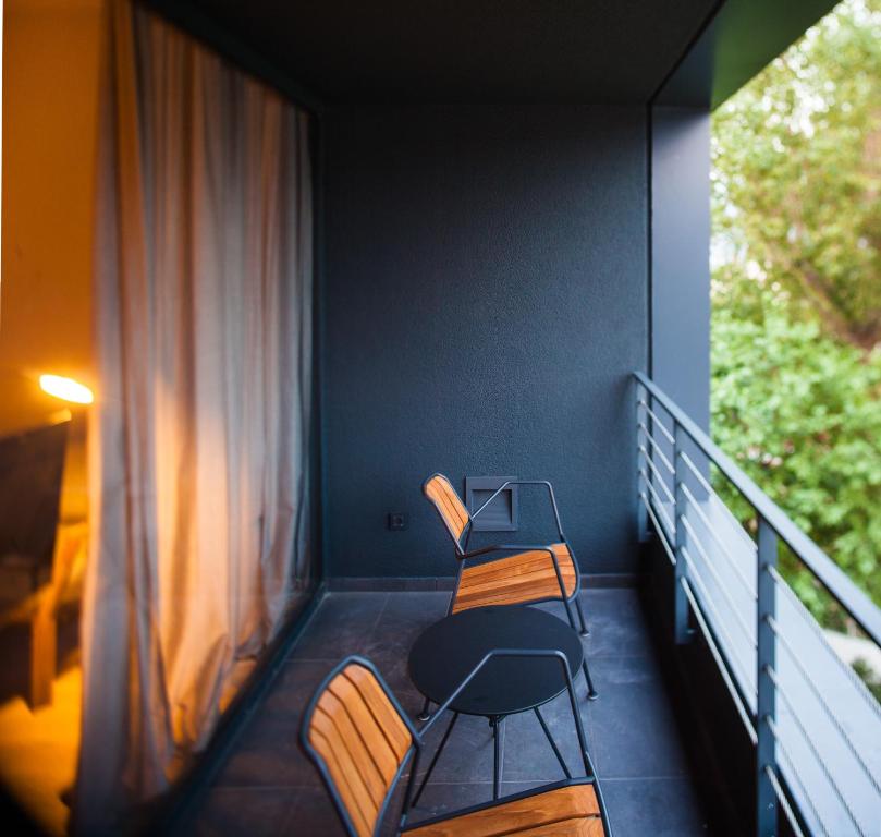Posezení v ubytování One Suite Hotel