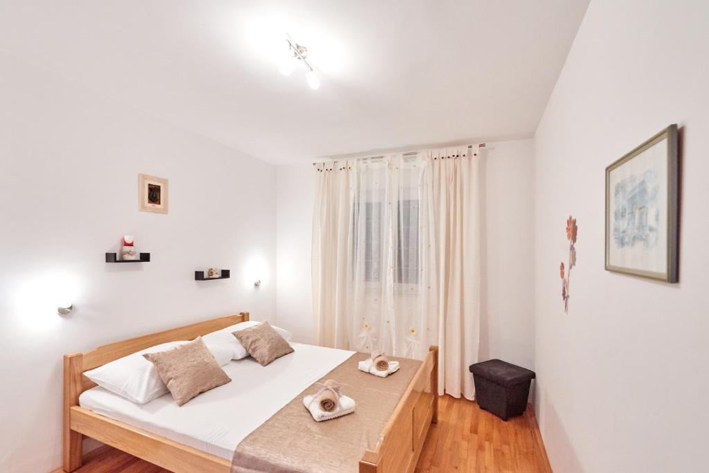Posteľ alebo postele v izbe v ubytovaní Sv. Ilija Apartment - Vila Biokova