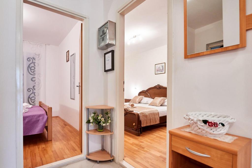 Posteľ alebo postele v izbe v ubytovaní Sv. Ilija Apartment - Vila Biokova