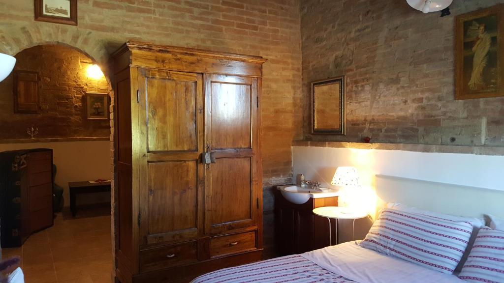 Postel nebo postele na pokoji v ubytování Casa Vacanze Fornace