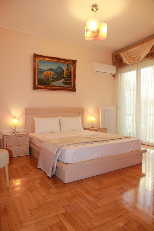 A bed or beds in a room at Olga's Studio