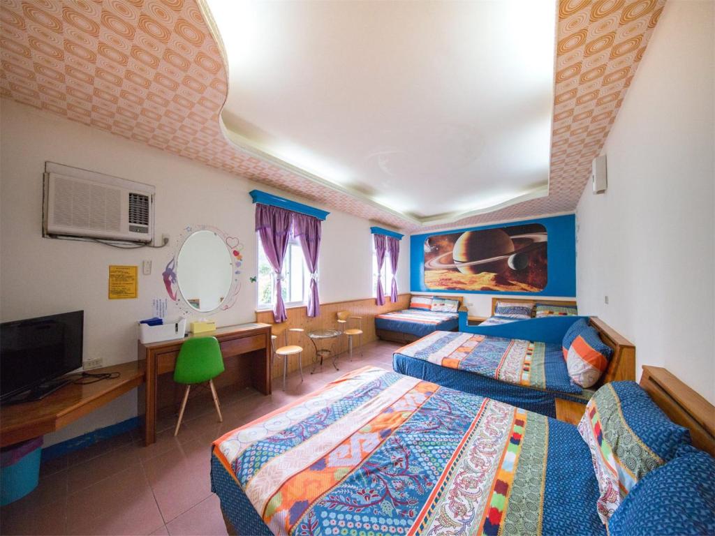 Postel nebo postele na pokoji v ubytování Blue Sea Romance B&B