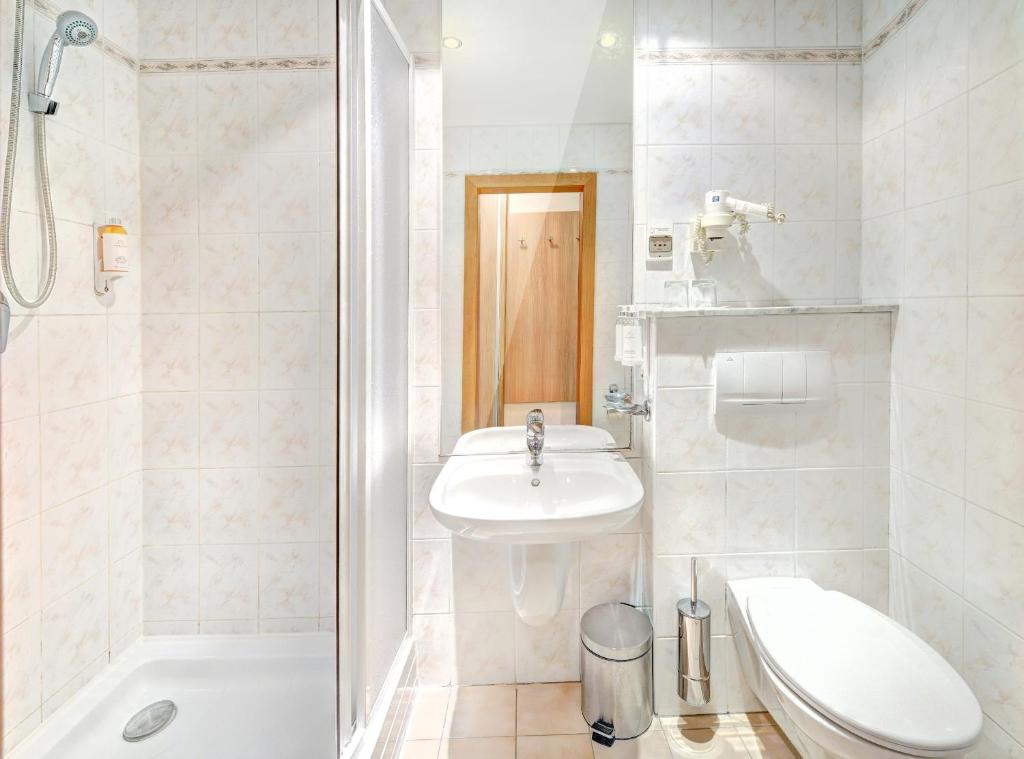 Koupelna v ubytování Hotel FIS