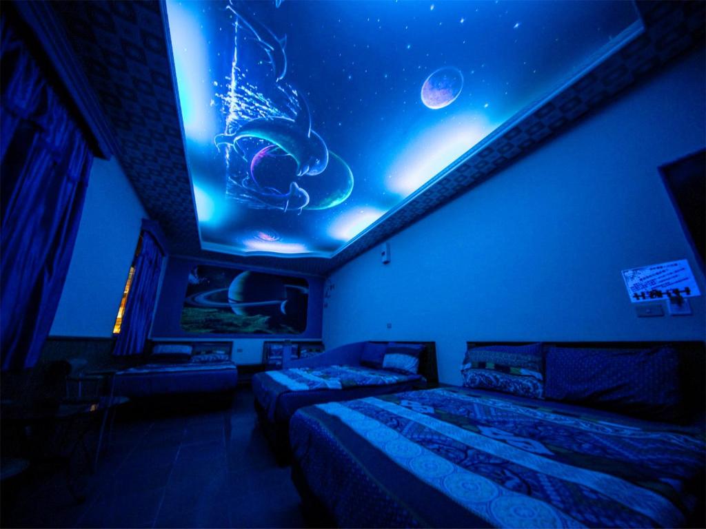 Postel nebo postele na pokoji v ubytování Blue Sea Romance B&B