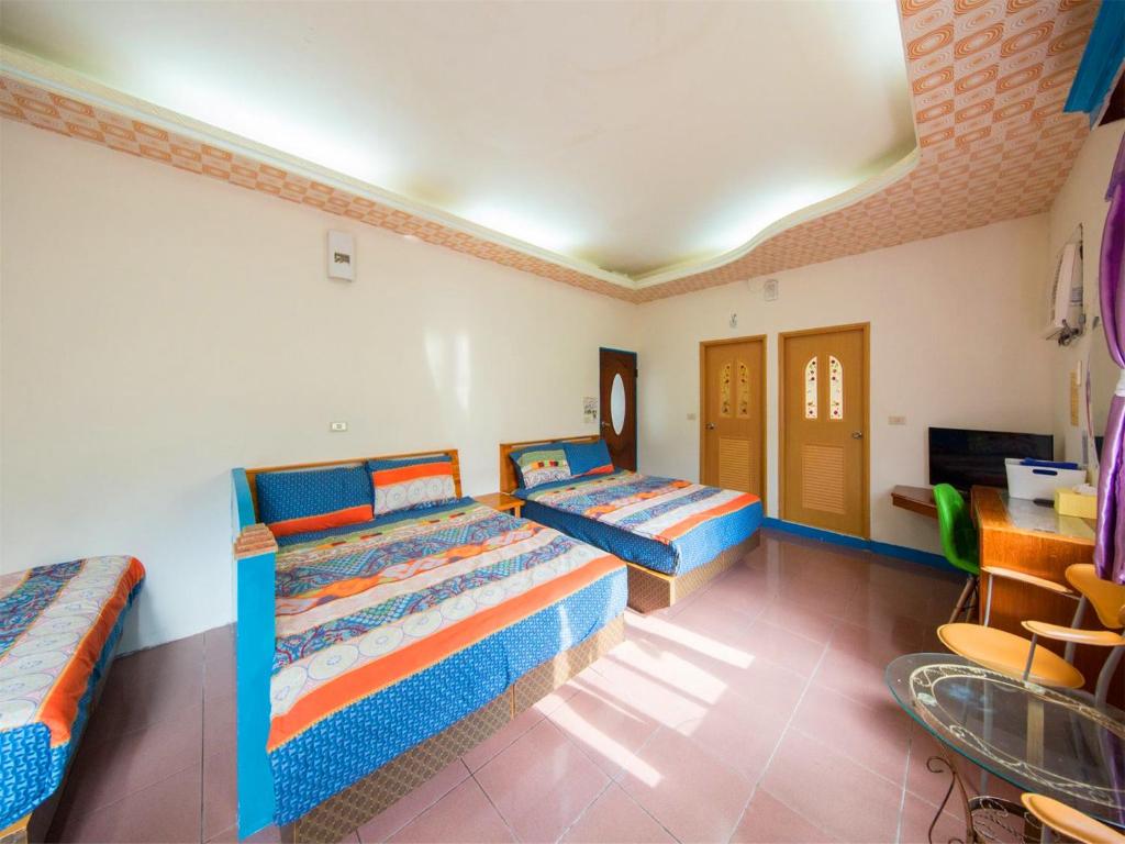 Postel nebo postele na pokoji v ubytování Blue Sea Romance B&B
