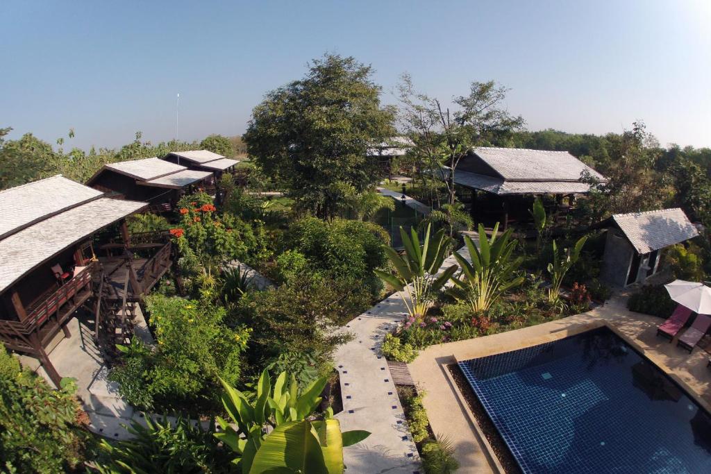 an aerial view of a resort with a swimming pool at Little Village Chiang Mai in Chiang Mai