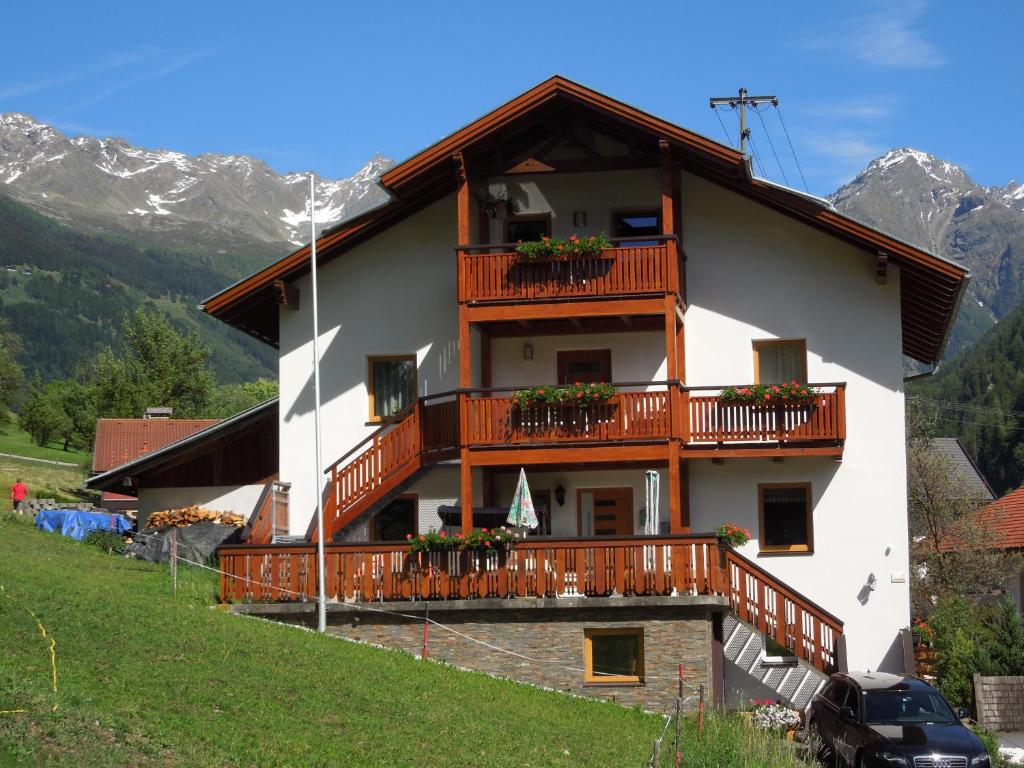 a building with balconies on the side of it at Haus Möslehof in Kauns