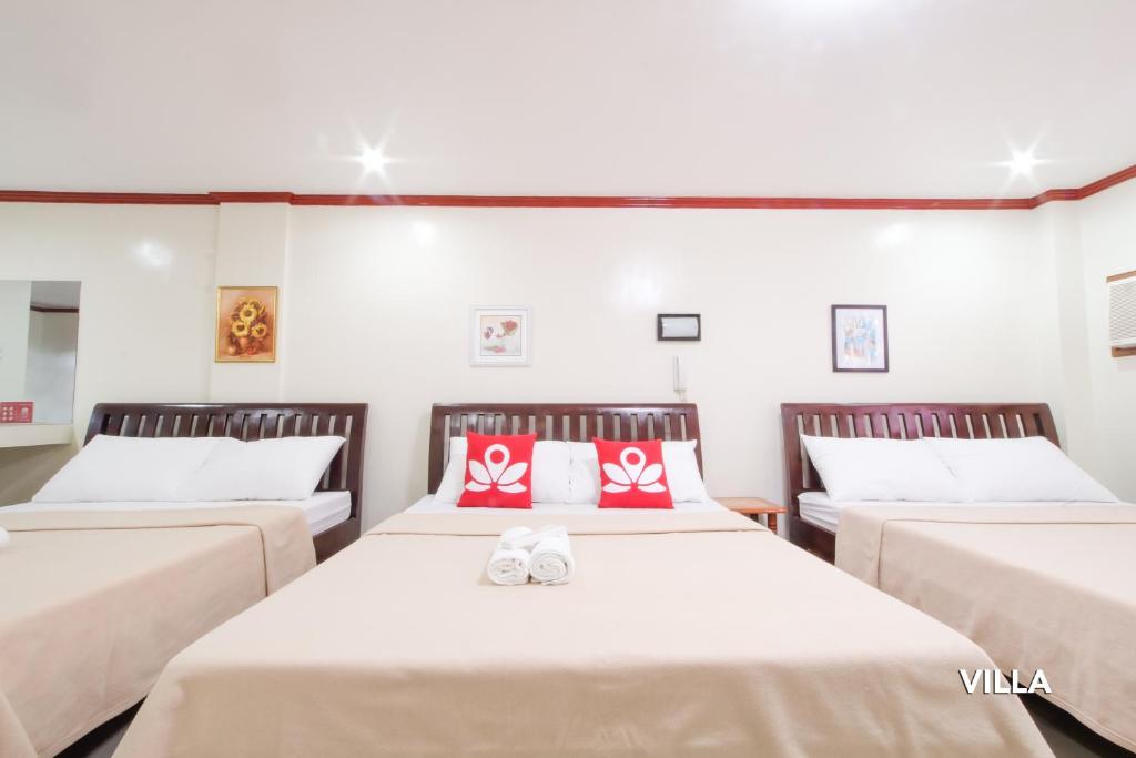 Postel nebo postele na pokoji v ubytování Hotel Georgina