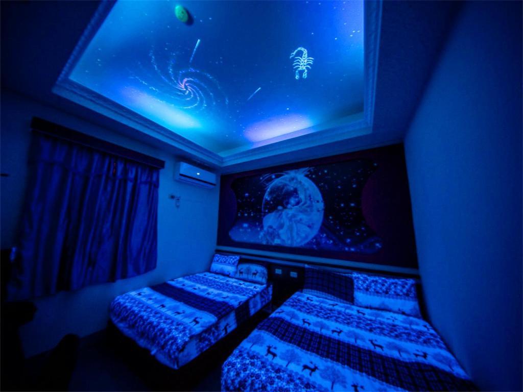 Postel nebo postele na pokoji v ubytování Blue Sea Romance B&B