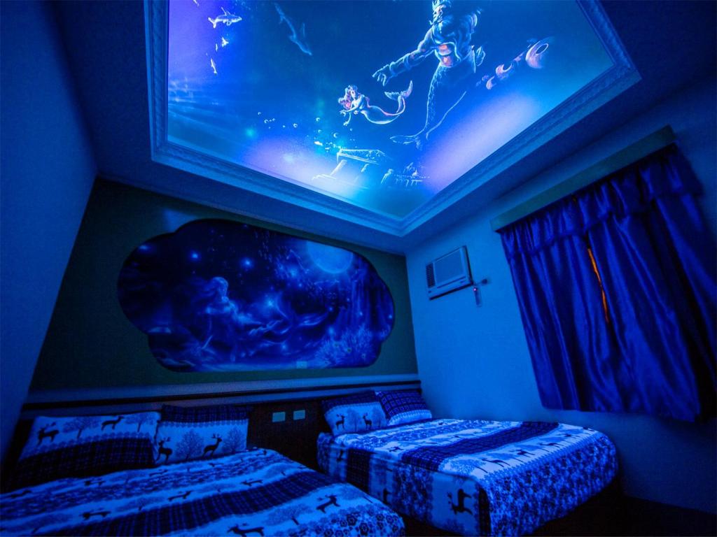 Postel nebo postele na pokoji v ubytování Blue Sea Romance B&B