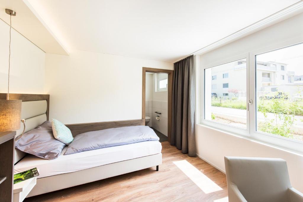 Krevet ili kreveti u jedinici u okviru objekta Hotel Tilia