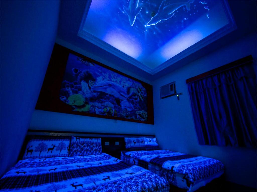 Postel nebo postele na pokoji v ubytování Blue Sea Romance B&B
