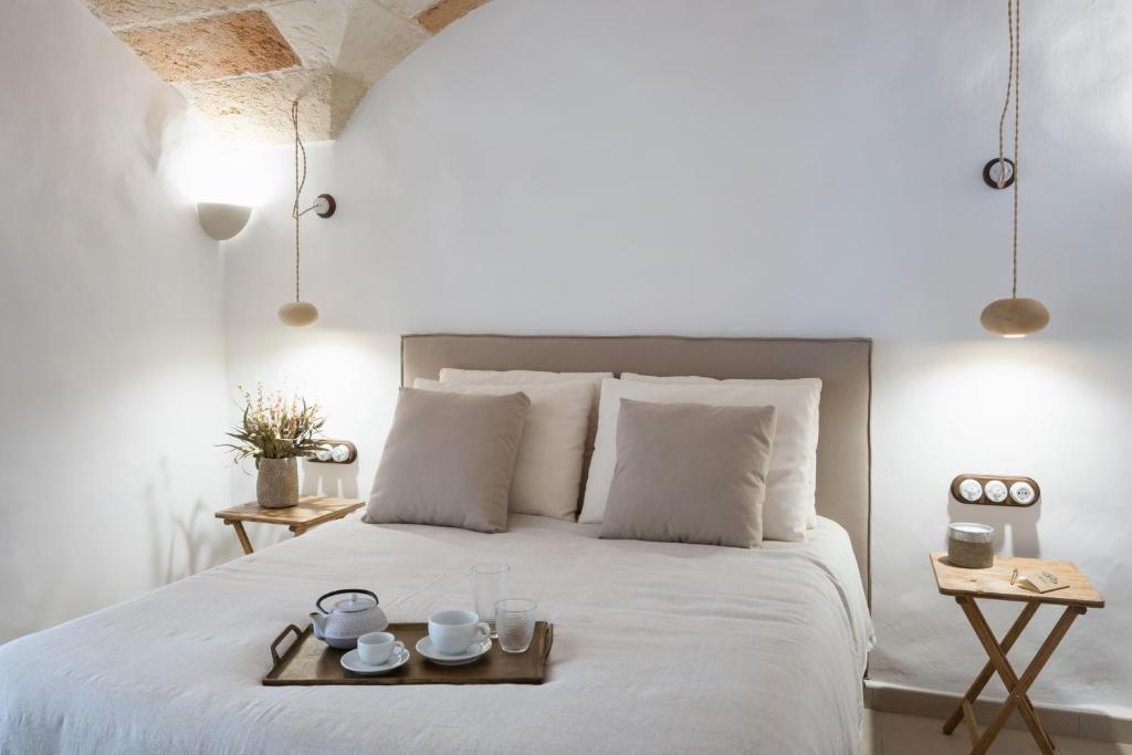 Кровать или кровати в номере Hotel Nou Sant Antoni