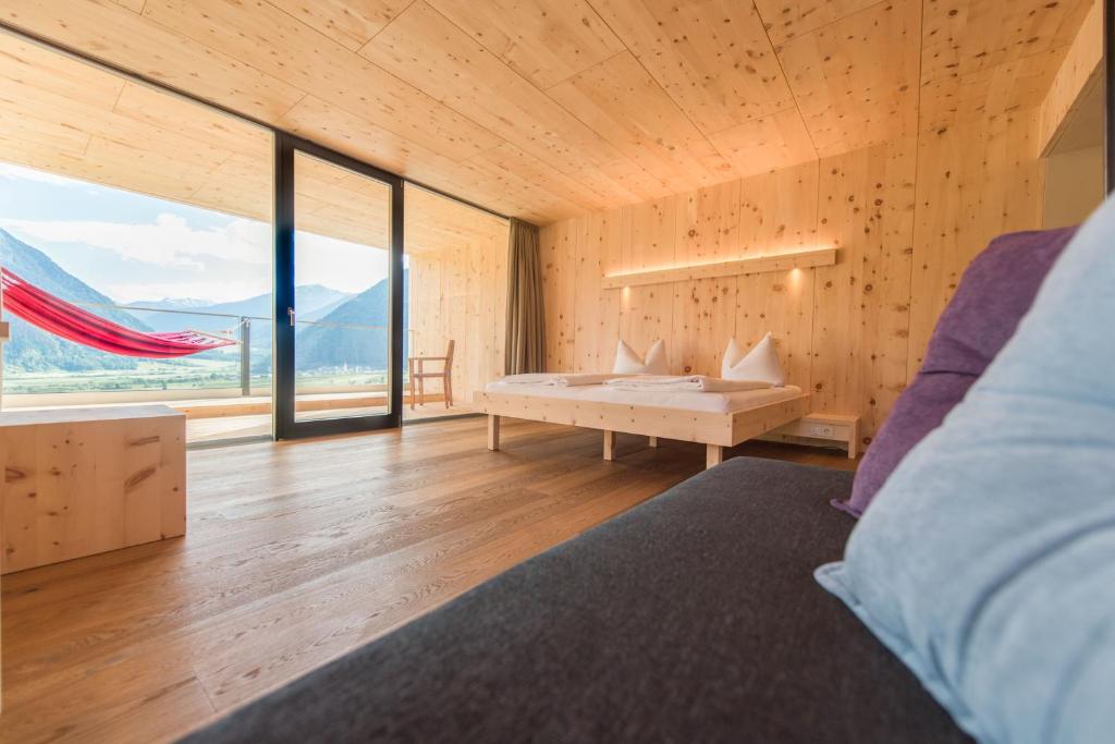 Postel nebo postele na pokoji v ubytování Bio Hotel Panorama