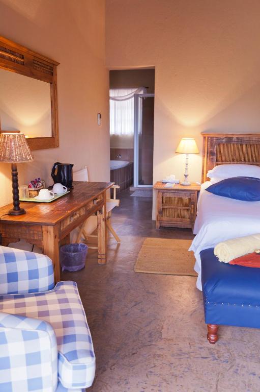 Postel nebo postele na pokoji v ubytování Needles Lodge