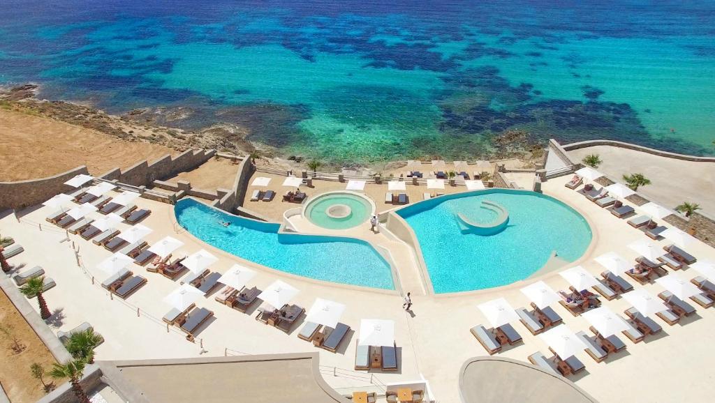 an aerial view of a resort with a swimming pool at Anax Resort and Spa in Agios Ioannis Mykonos