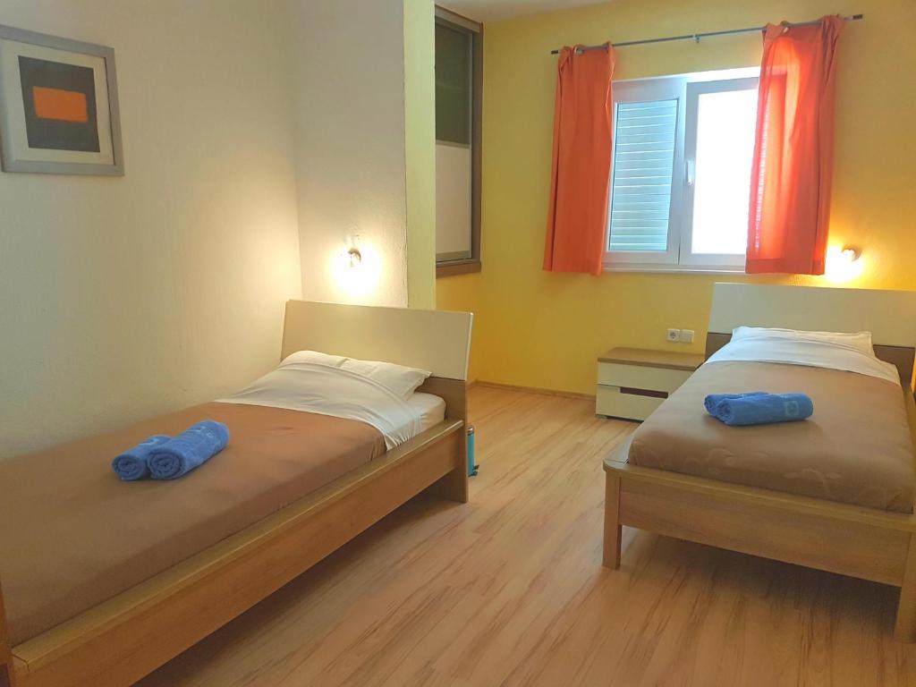 Postel nebo postele na pokoji v ubytování Apartment MORE Island Vis