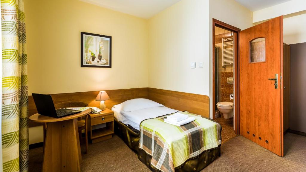 Posteľ alebo postele v izbe v ubytovaní Hotel City SM Business & Spa