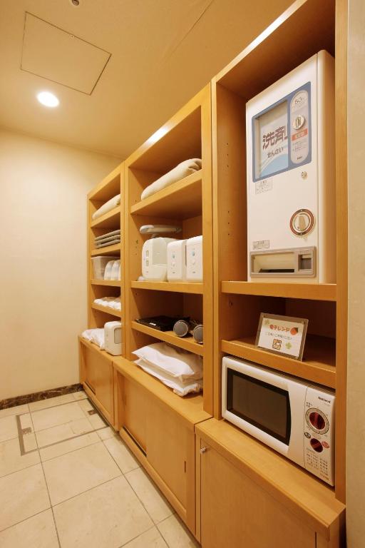 Kuchyň nebo kuchyňský kout v ubytování Hotel Lumiere Kasai