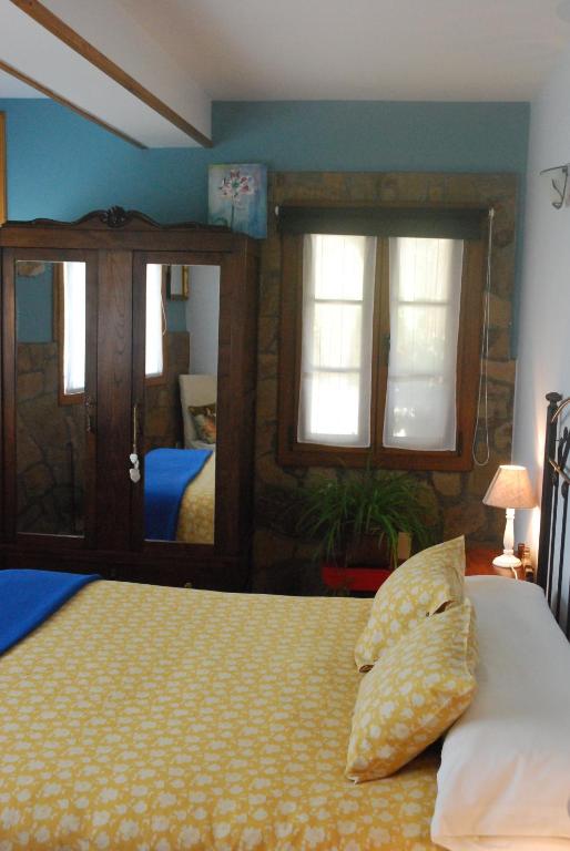Posteľ alebo postele v izbe v ubytovaní Casa Bartulo
