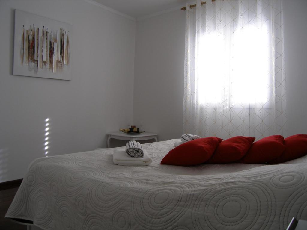 Postel nebo postele na pokoji v ubytování Villa Memories