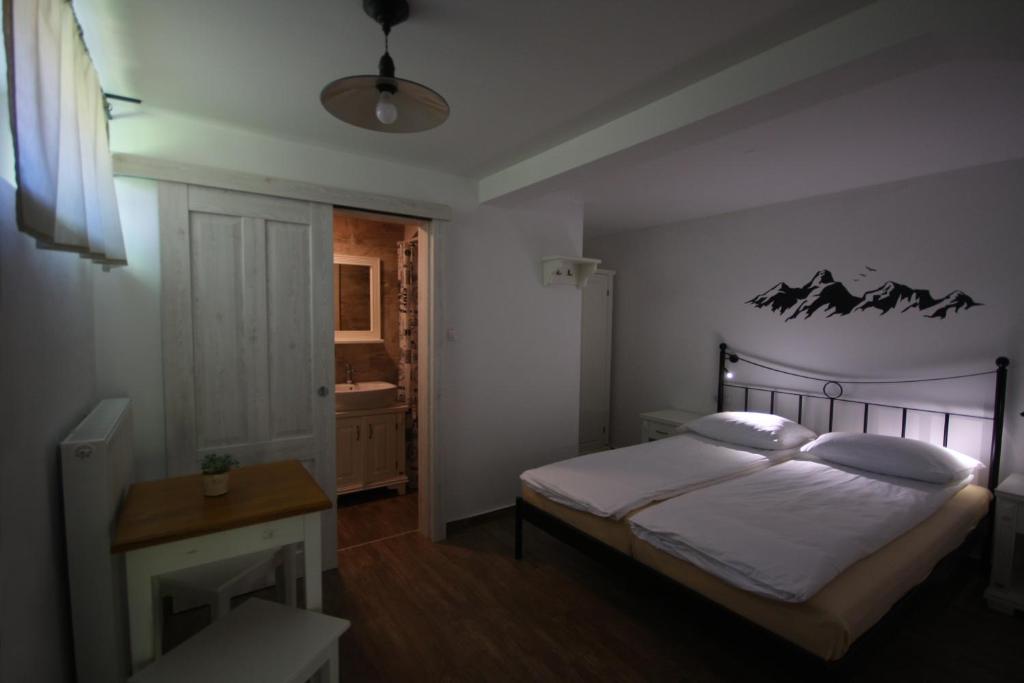 Postel nebo postele na pokoji v ubytování Hostel Hildegarden
