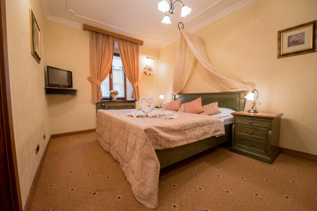 Postel nebo postele na pokoji v ubytování Hotel Octarna - Free parking