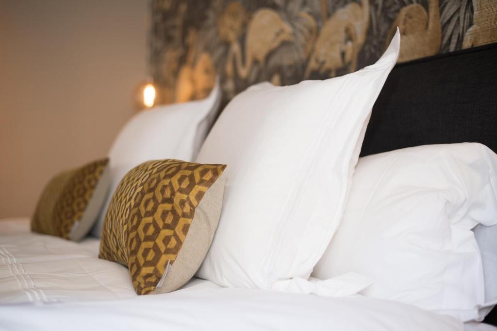 Postel nebo postele na pokoji v ubytování Hotel 't Keershuys