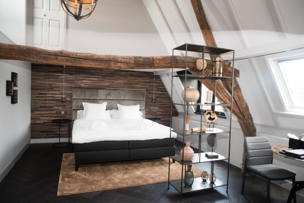 Postel nebo postele na pokoji v ubytování Hotel 't Keershuys