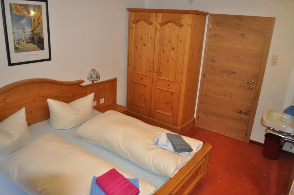 Postel nebo postele na pokoji v ubytování Haus Tina