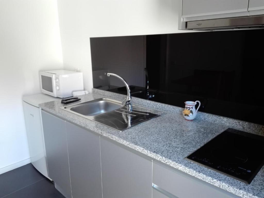 Kuchyň nebo kuchyňský kout v ubytování Casa Da Gaiteira