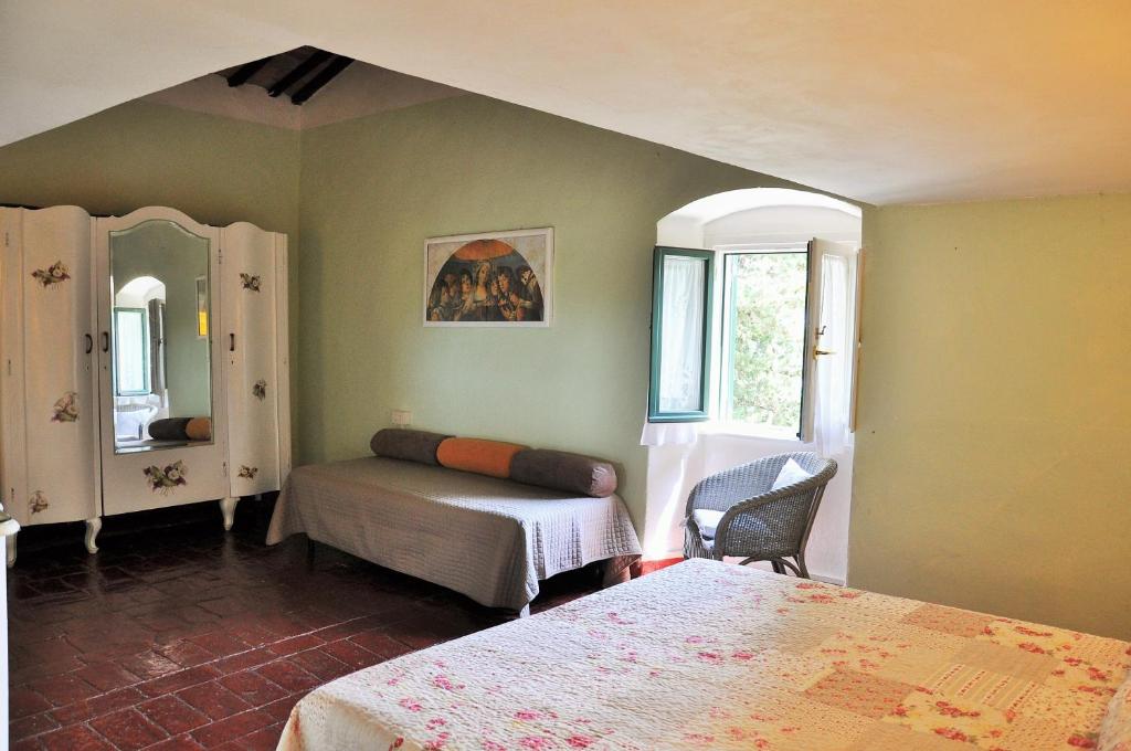 A bed or beds in a room at Agriturismo La Villa Romita