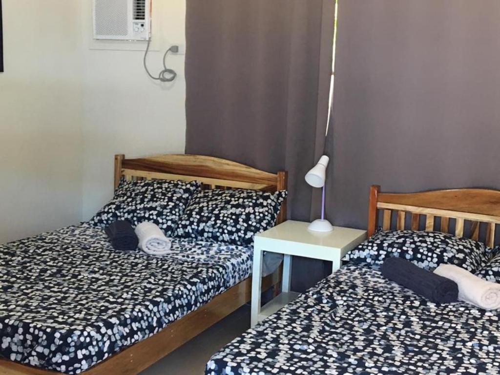Postel nebo postele na pokoji v ubytování Stardust Beach Hotel