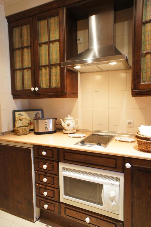 Kuchyň nebo kuchyňský kout v ubytování Casavillena Apartamentos Turísticos