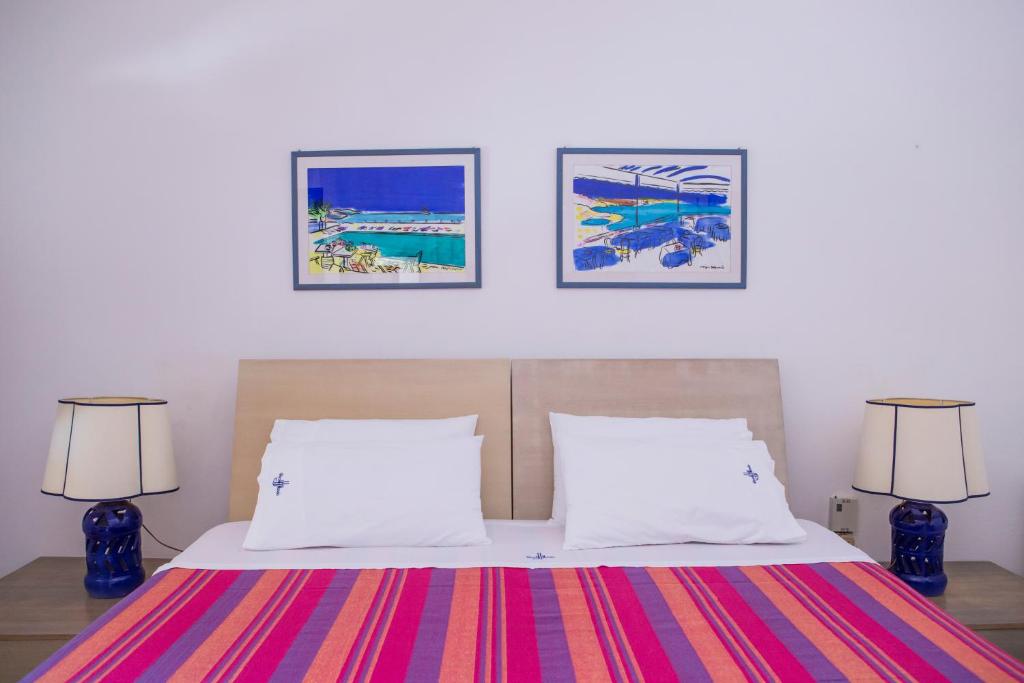 Postel nebo postele na pokoji v ubytování Hotel Piccolo Mondo
