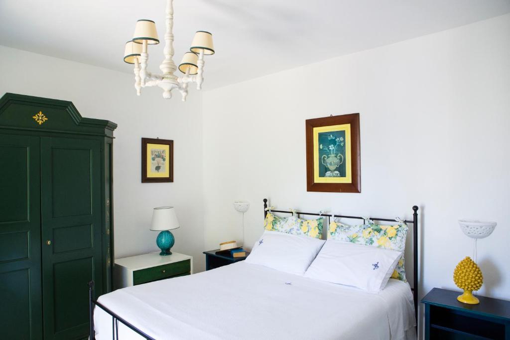 Postel nebo postele na pokoji v ubytování Hotel Piccolo Mondo