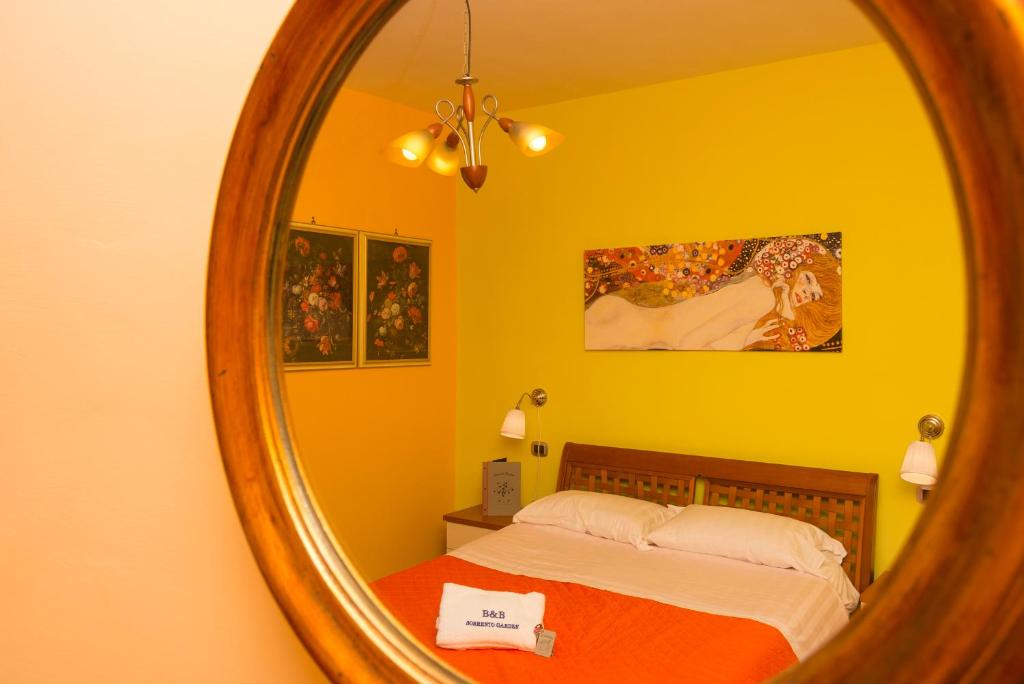 Postel nebo postele na pokoji v ubytování b&b Sorrento Garden