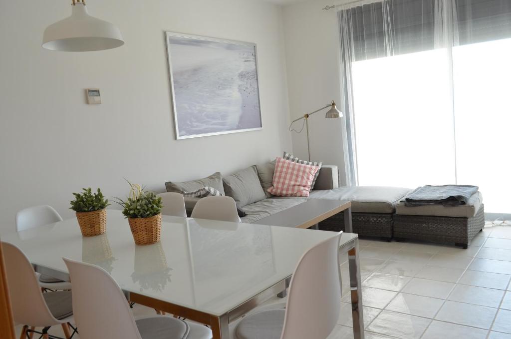 Posedenie v ubytovaní Apartamentos Macenas